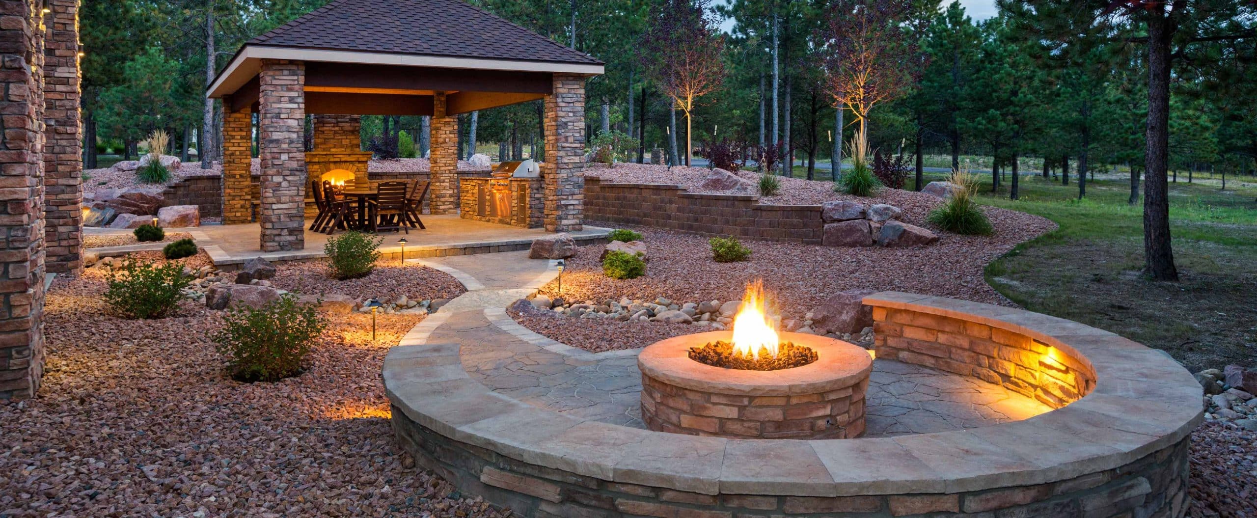 outdoor kitchen and fireplace